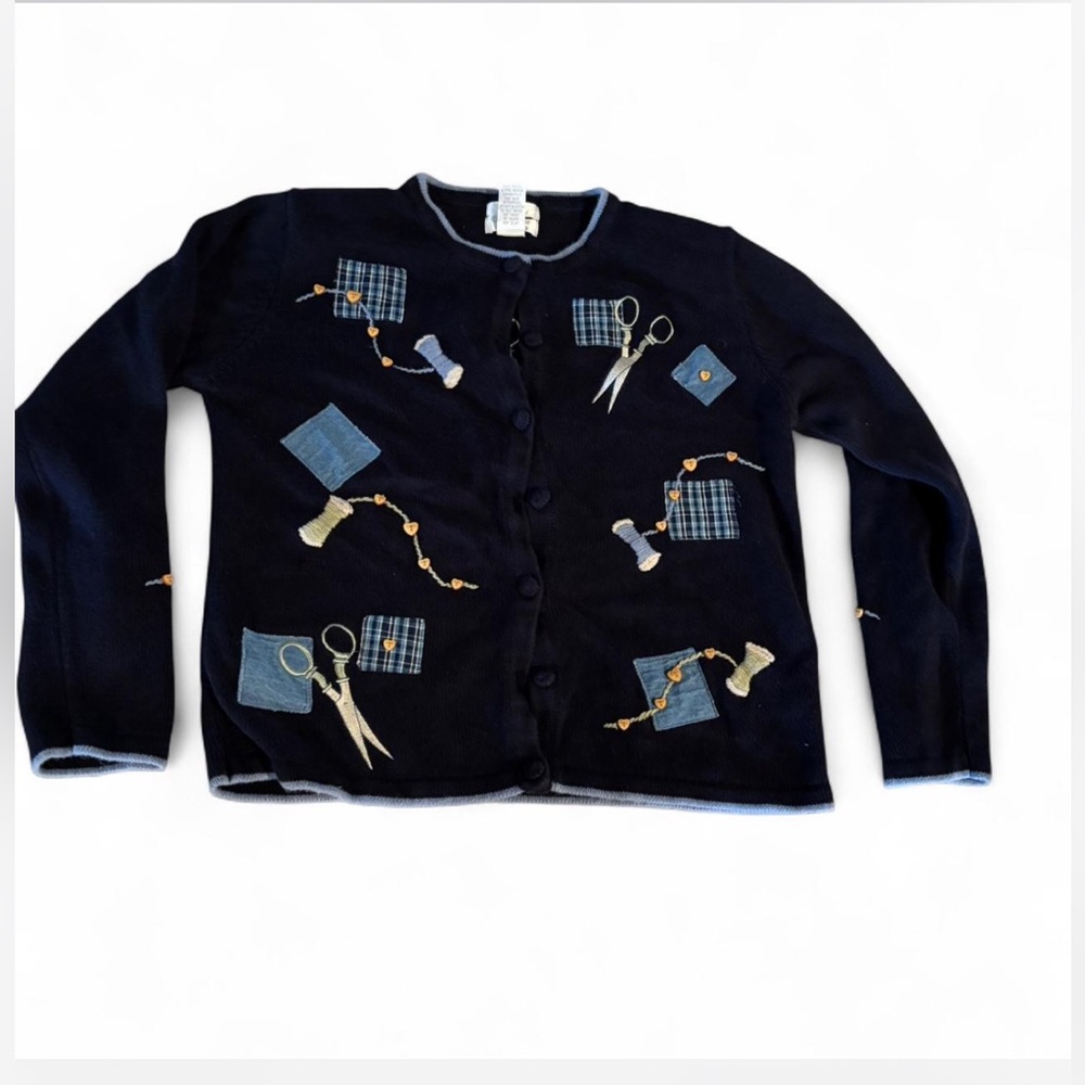 Navy blue knit cardigan with hand embroidered details